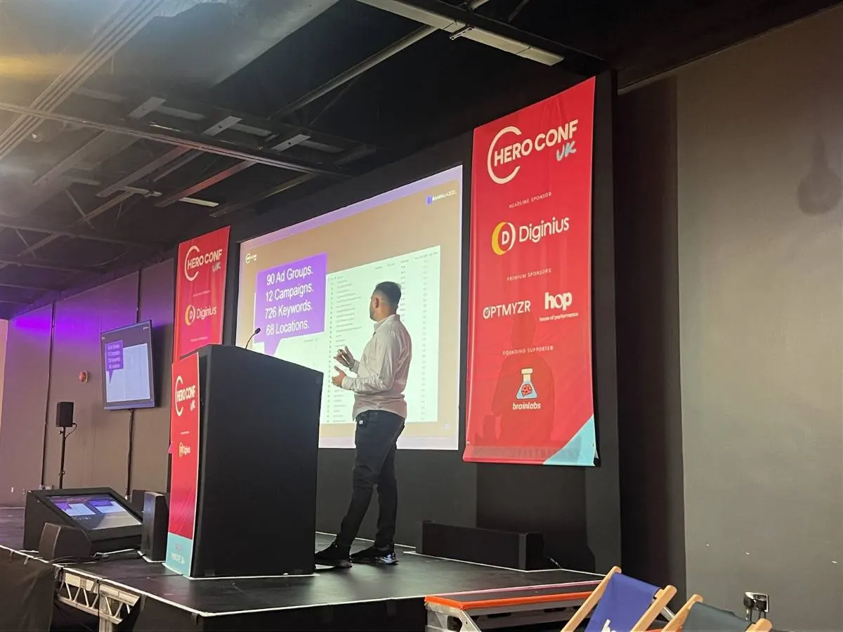 Ramial Aqeel speaking on stage at Hero Conf UK